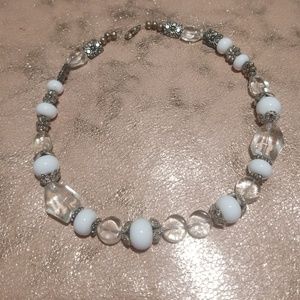 White beats,clear stones with silver flowers